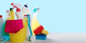basket-with-cleaning-products-on-blue-background-2022-12-11-23-54-30-utc